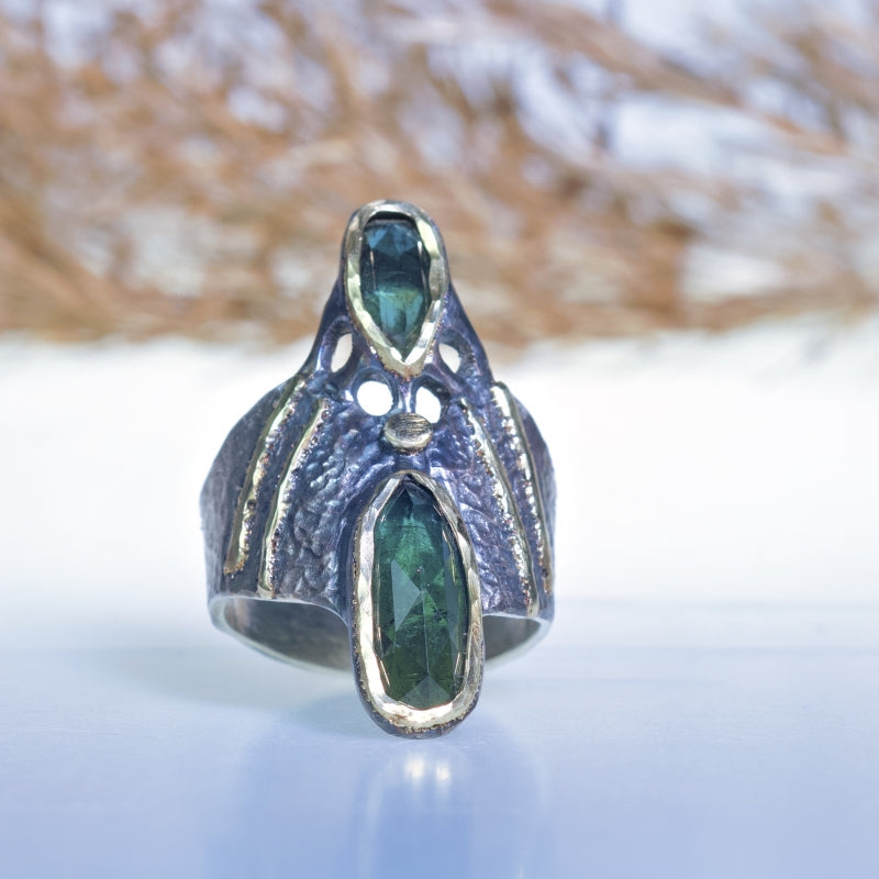 Wide ring with two teal rose cut tourmalines