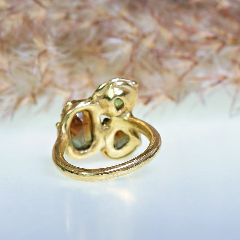 Gold ring with three brown sapphires