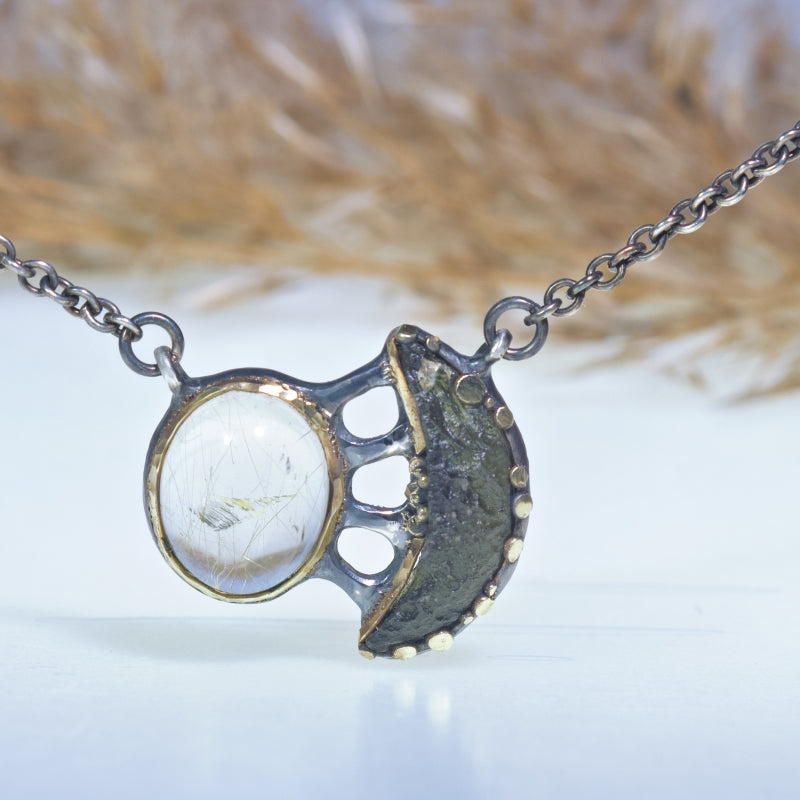 Necklace with moon shape moldavit and sagenit