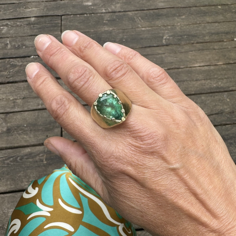 Statement gold ring with big emerald and hand carved band