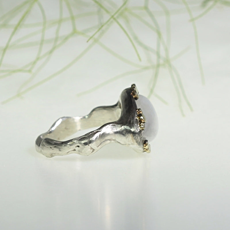 Ring with rainbow moonstone and gold dots