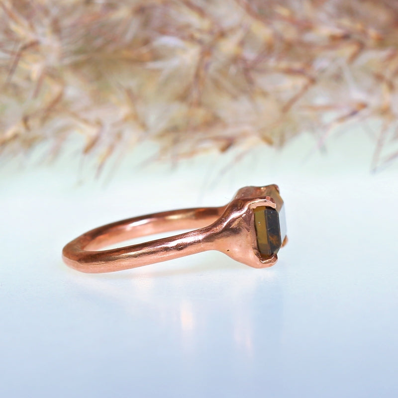 Rose gold ring with small bicolor tourmaline