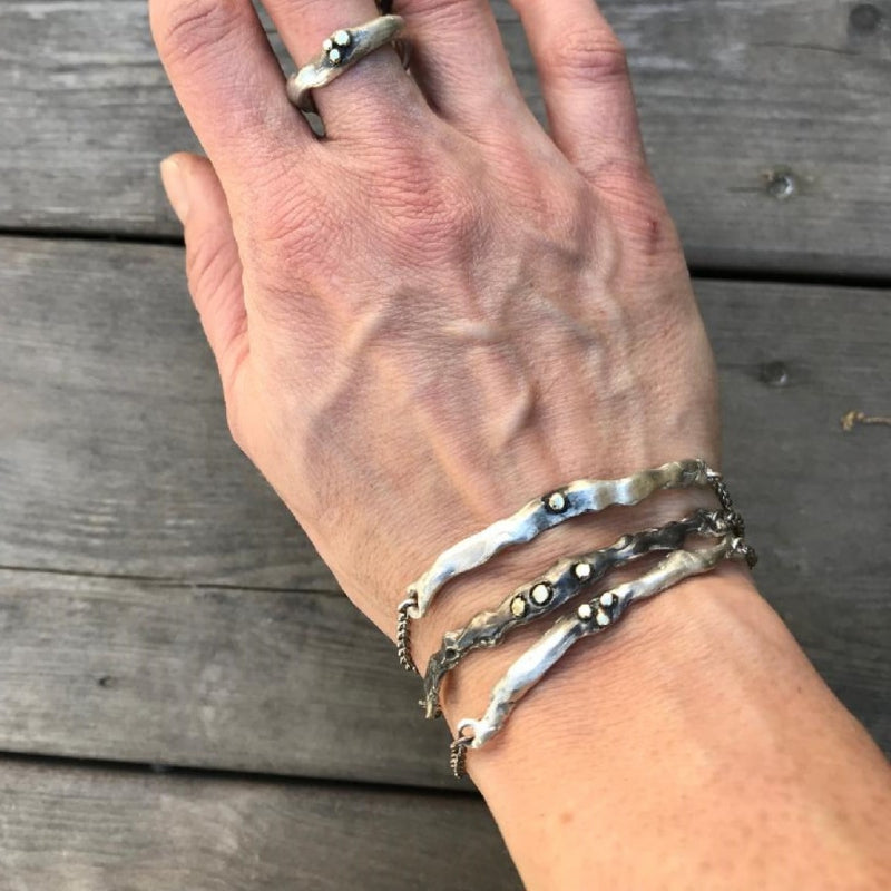 Bracelet Simply metals with three gold dots