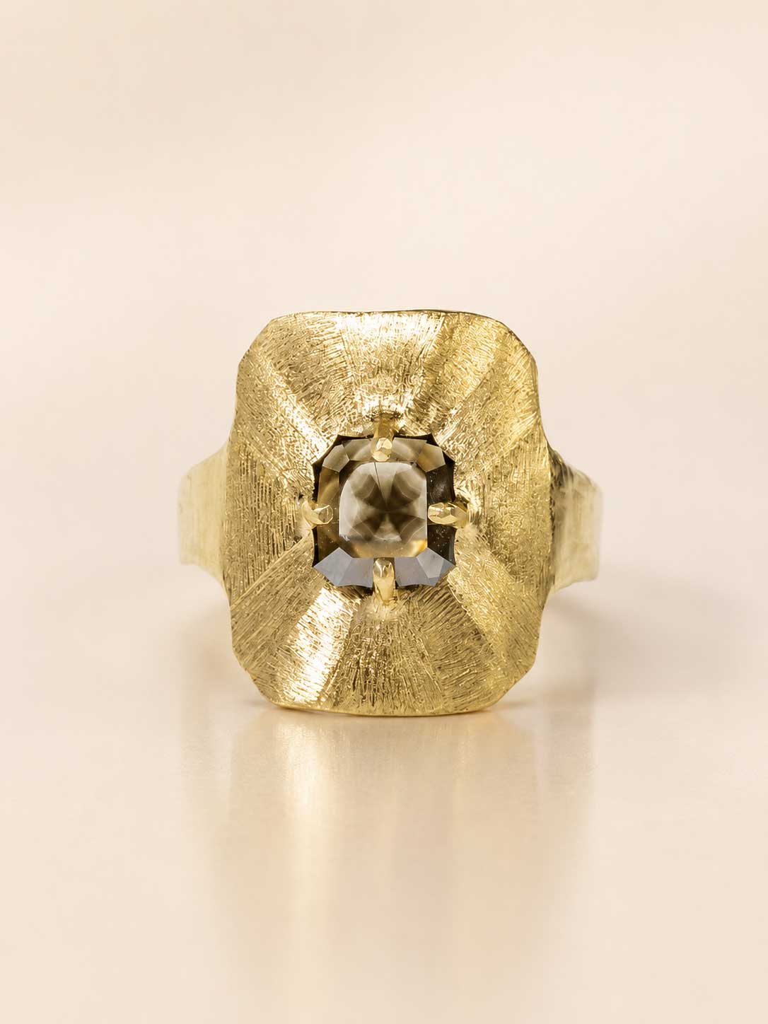 18k gold ring with rare asterized diamond