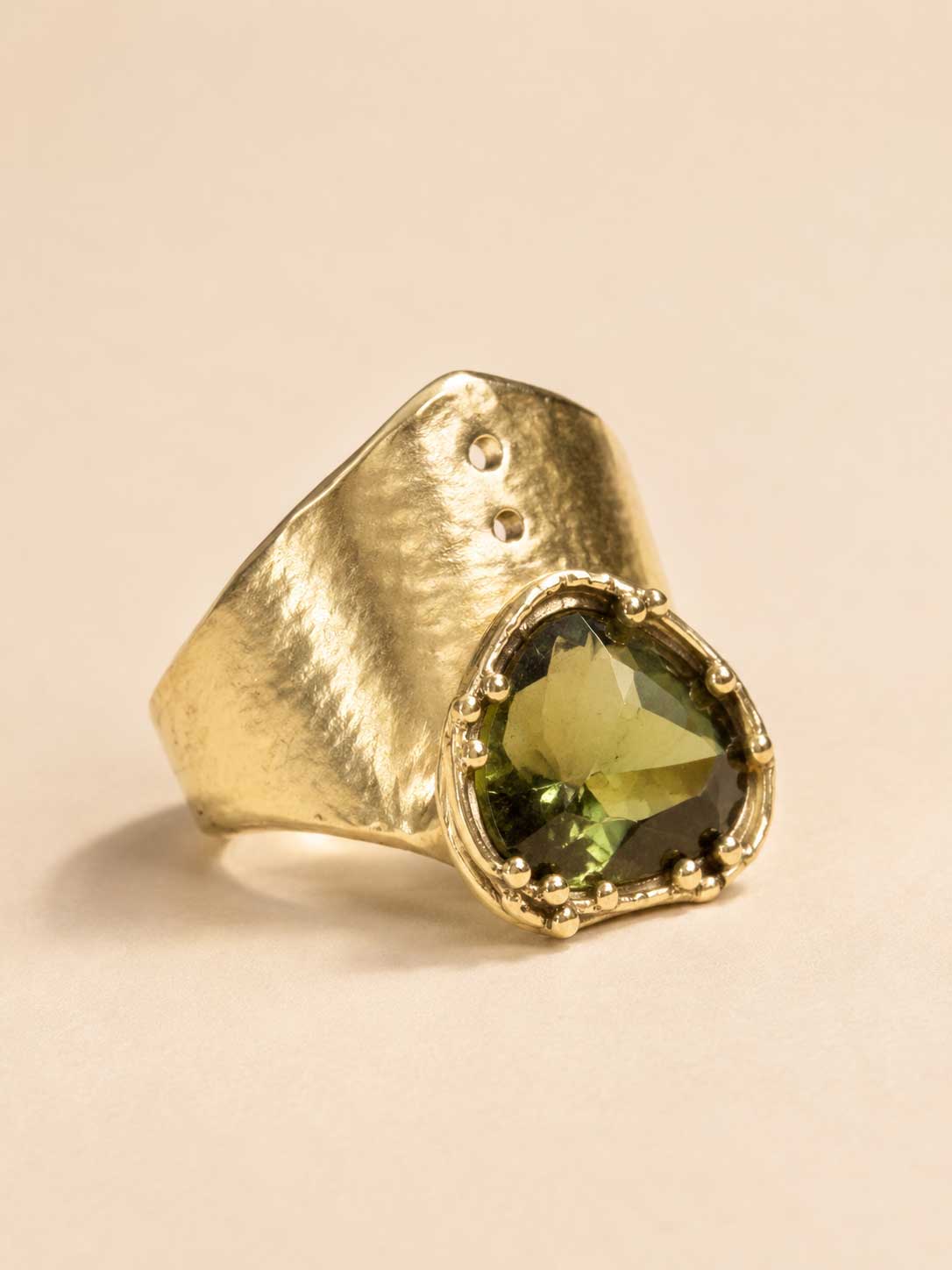 Wide gold ring with heart shape moldavite