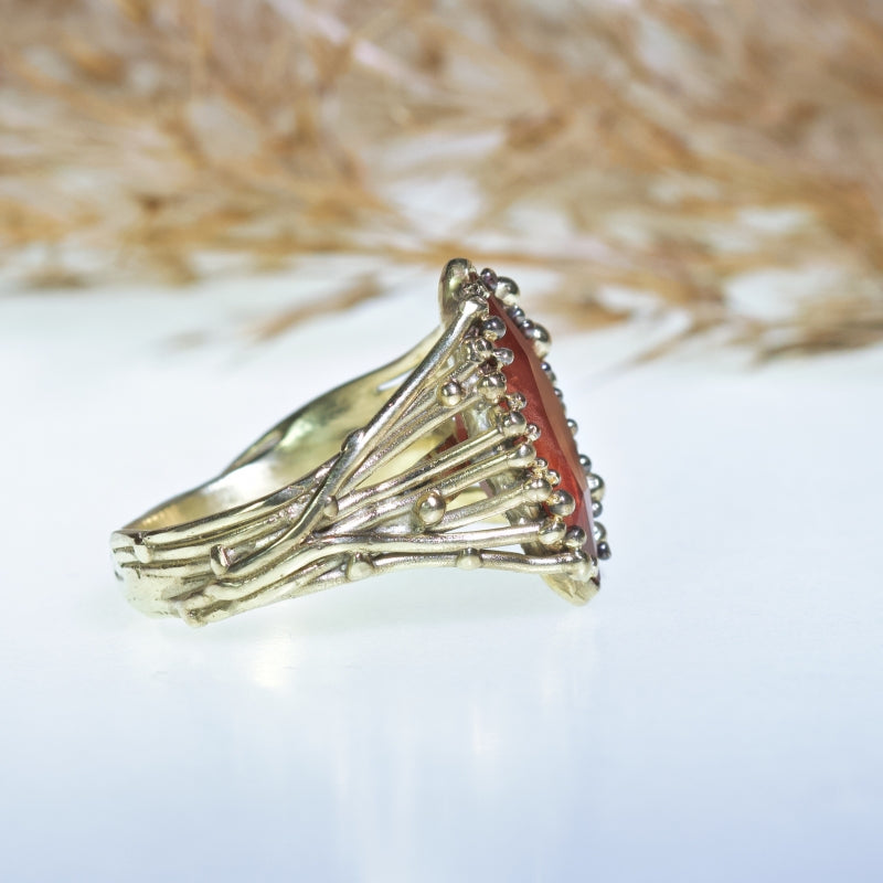 Gold ring with orange Oregon sunstone