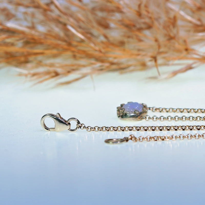 White gold necklace with crystal opal wing