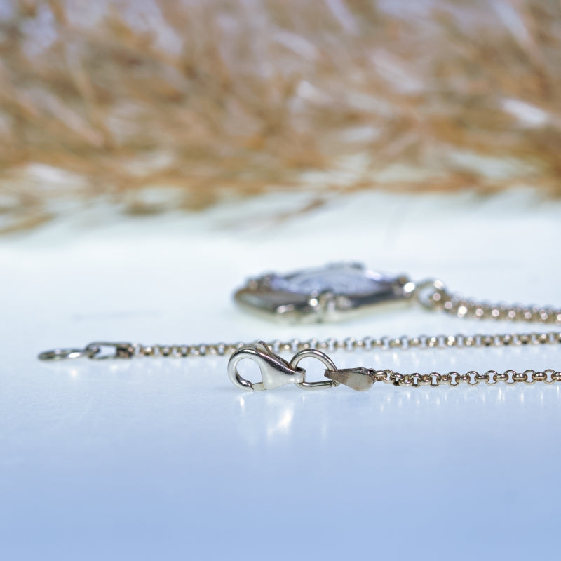White gold necklace with handcarved morganite