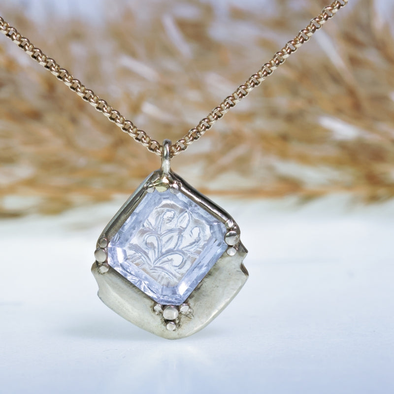 White gold necklace with handcarved morganite