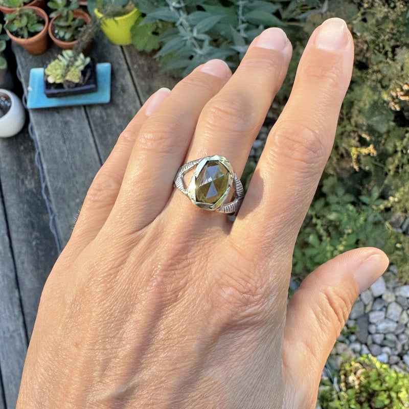 Ring with sphene/titanite and hand engraved band
