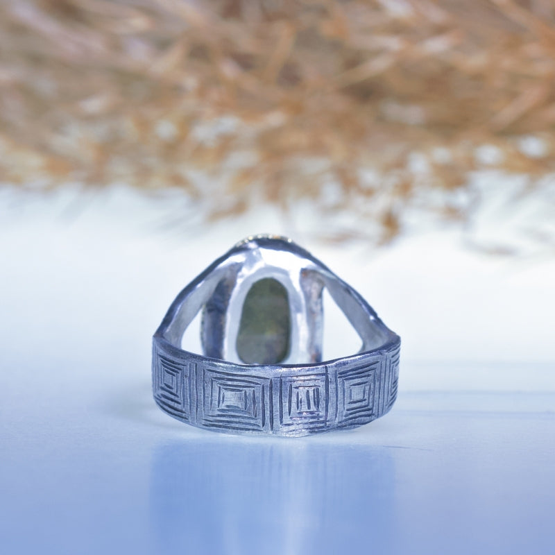 Ring with sphene/titanite and hand engraved band