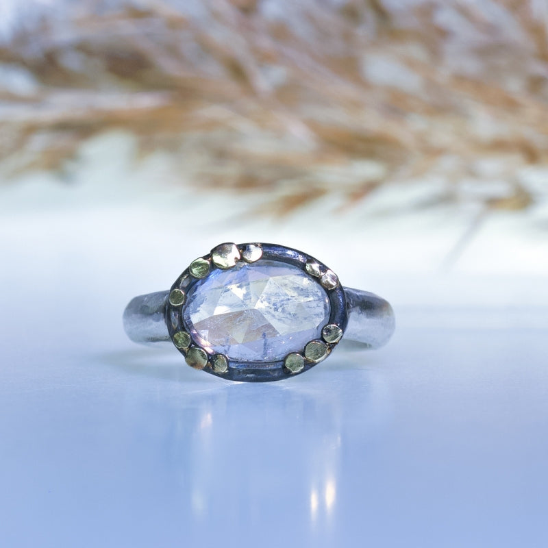 Ring with oval moostone