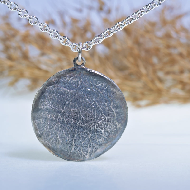 Big Heart round amulet
