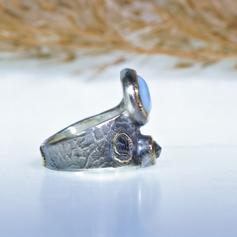 Wide ring with larimar and spinel
