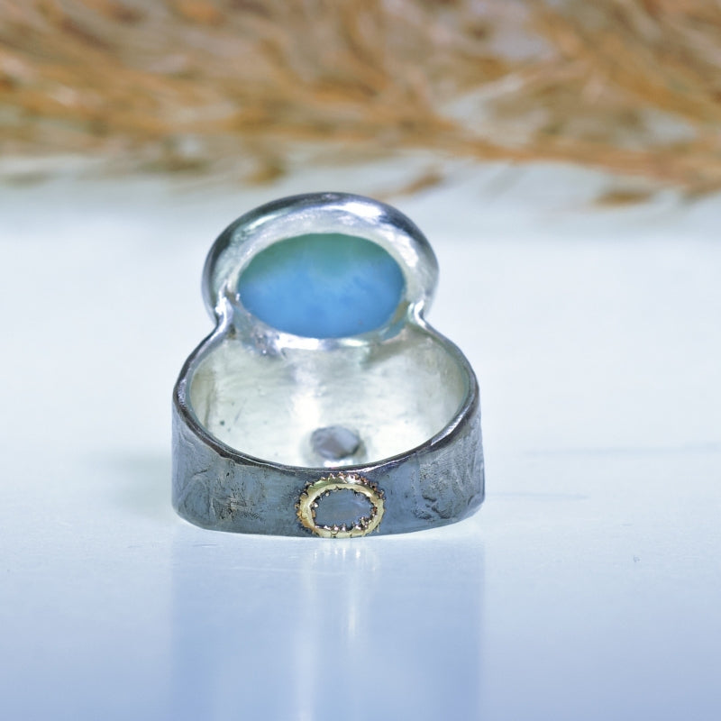 Wide ring with larimar and spinel