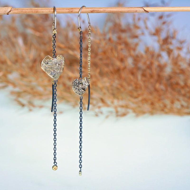 Long earrings with gold hearts