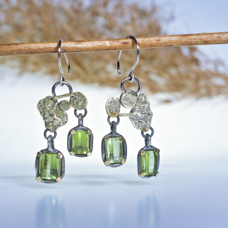 Hanging earrings with pixel cut peridots
