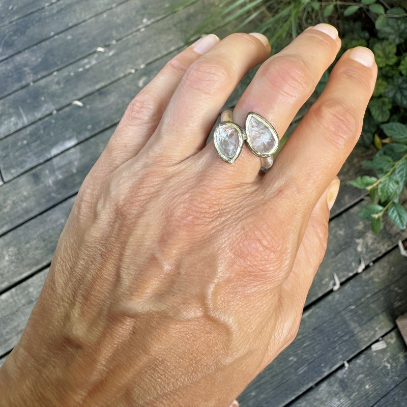 Ring with two pear shape moonstones