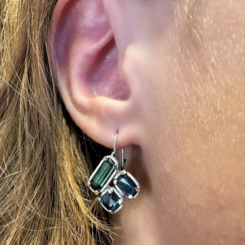 White gold earrings with green-blue tourmalines