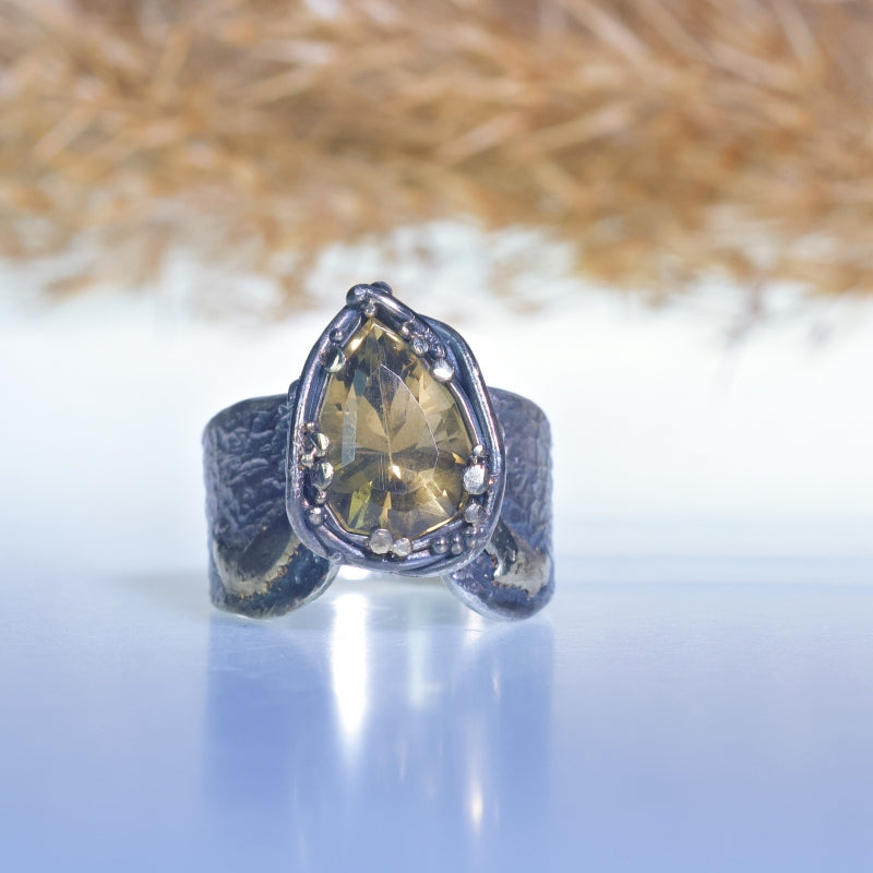 Wide ring with pear shape citrine
