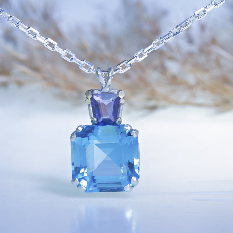 Necklace with blue topaz and amethyst