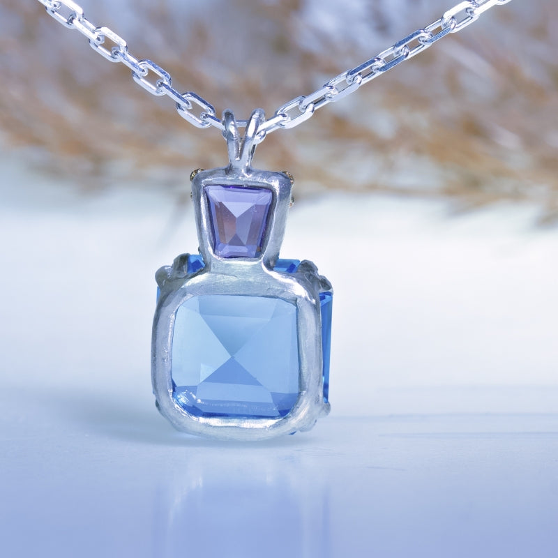 Necklace with blue topaz and amethyst