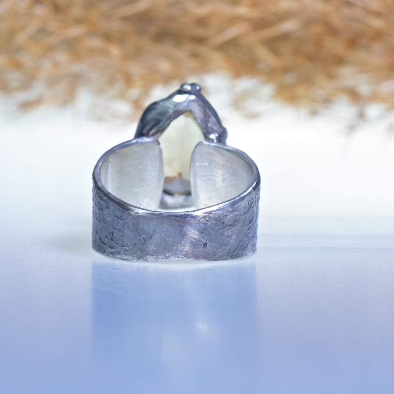Wide ring with pear shape citrine