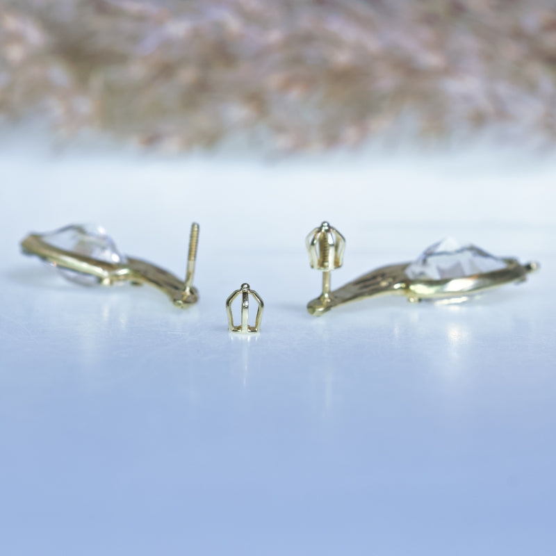 Gold stud earrings with danburite