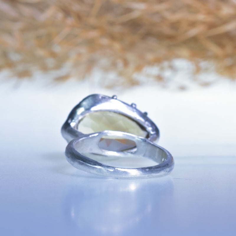 Ring with east-west pear shape precision cut citrine