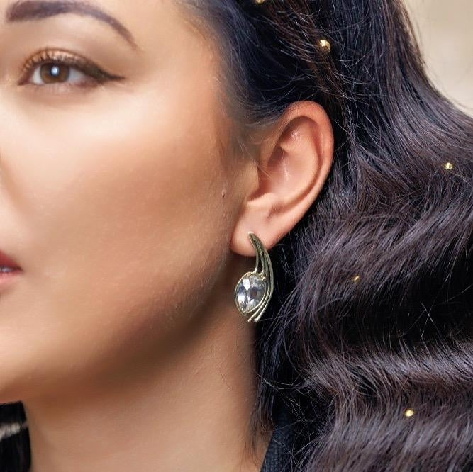 Gold stud earrings with danburite