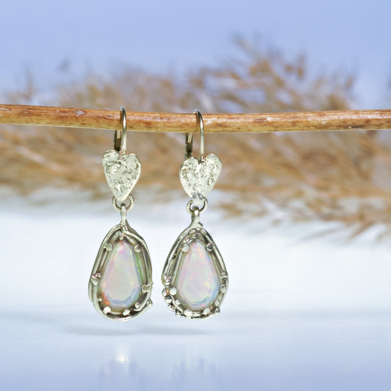 Gold earrings with opals and hearts
