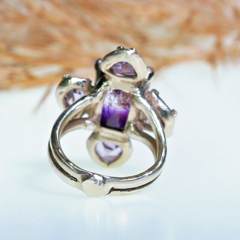 White gold ring with rutile amethyst and spinels