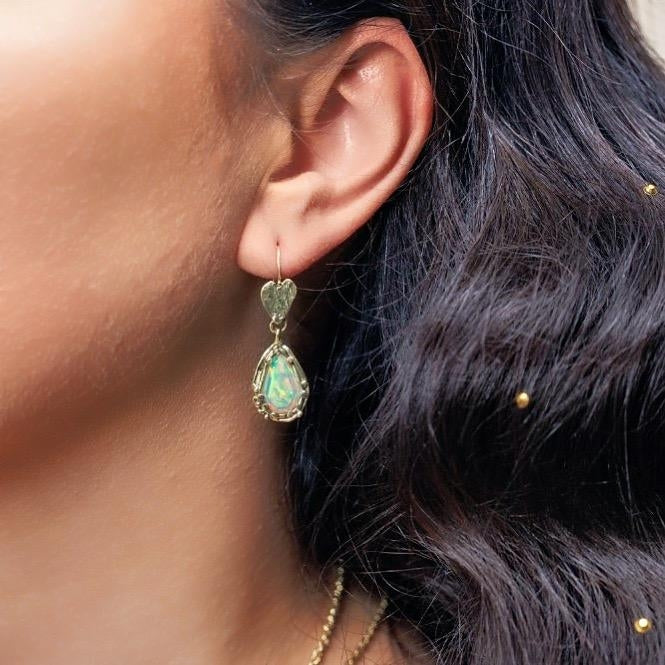 Gold earrings with opals and hearts
