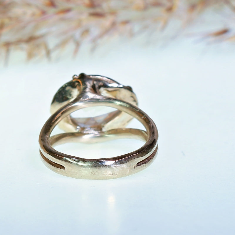 White gold ring with pear shape danburite