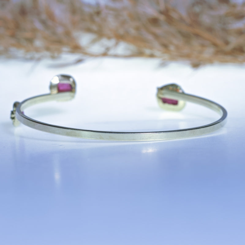 Gold bracelet with three pink tourmalines