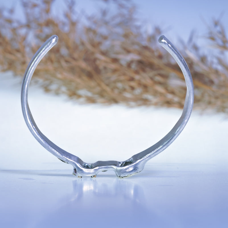 Cuff bracelet with two aquamarines