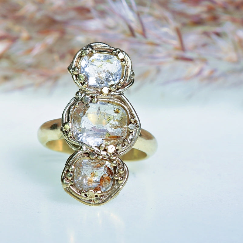Gold ring with three petroleum quartz