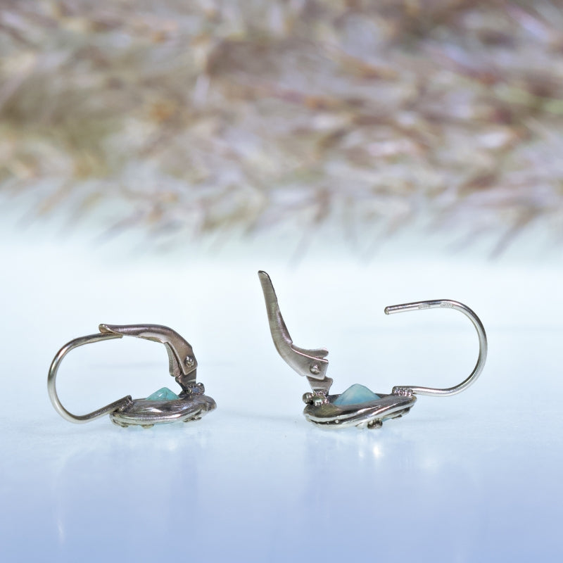 White gold earrings with gem silica
