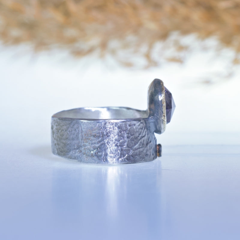 Ring with rutile amethyst and wide band