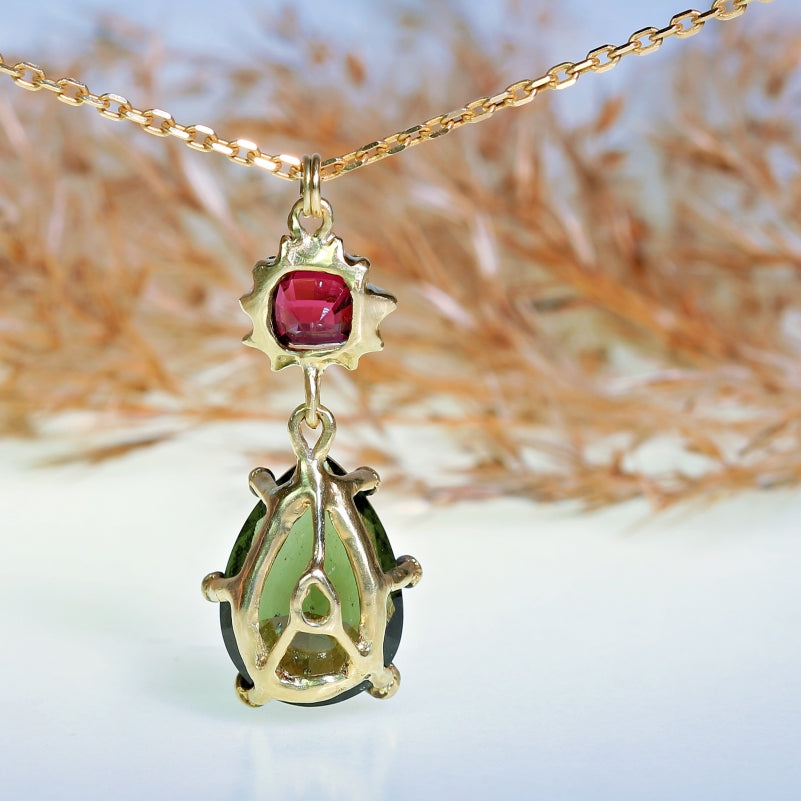 Gold necklace with moldavite and Umbalite garnet
