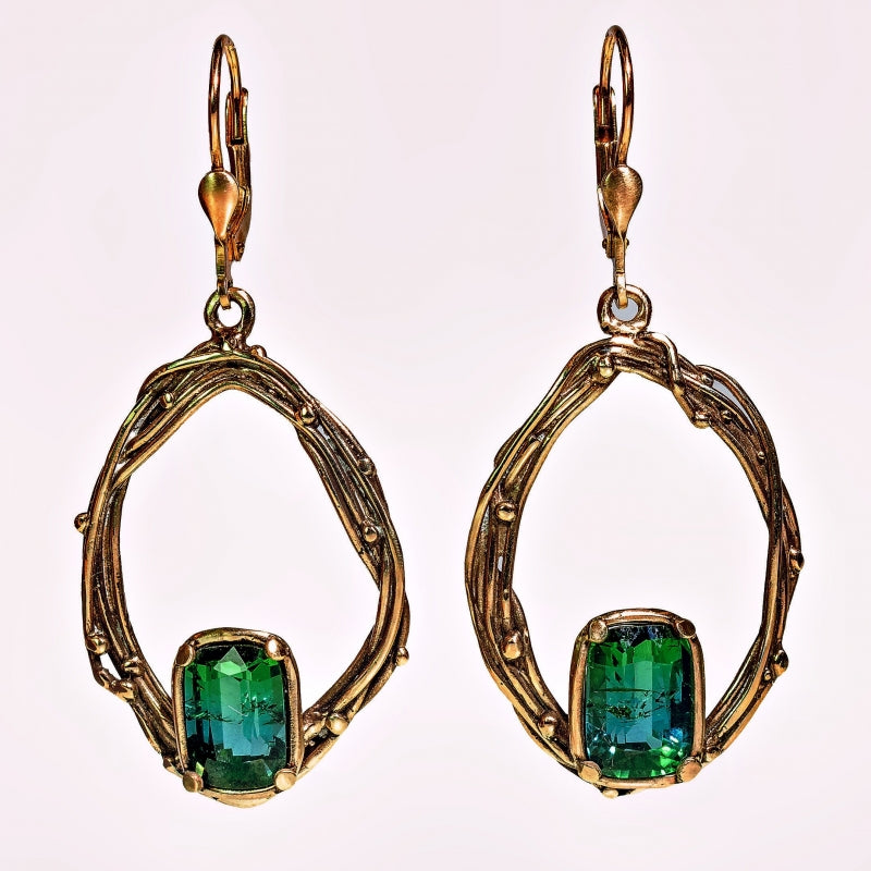 White gold earrings with blue-green tourmaline