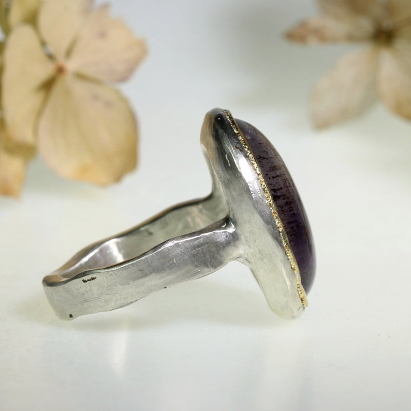 Ring with big Super 7/Melody stone