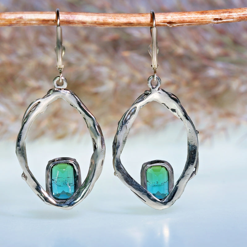 White gold earrings with blue-green tourmaline