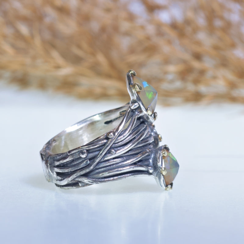 Wide Galaxy ring with three Ethiopian opals
