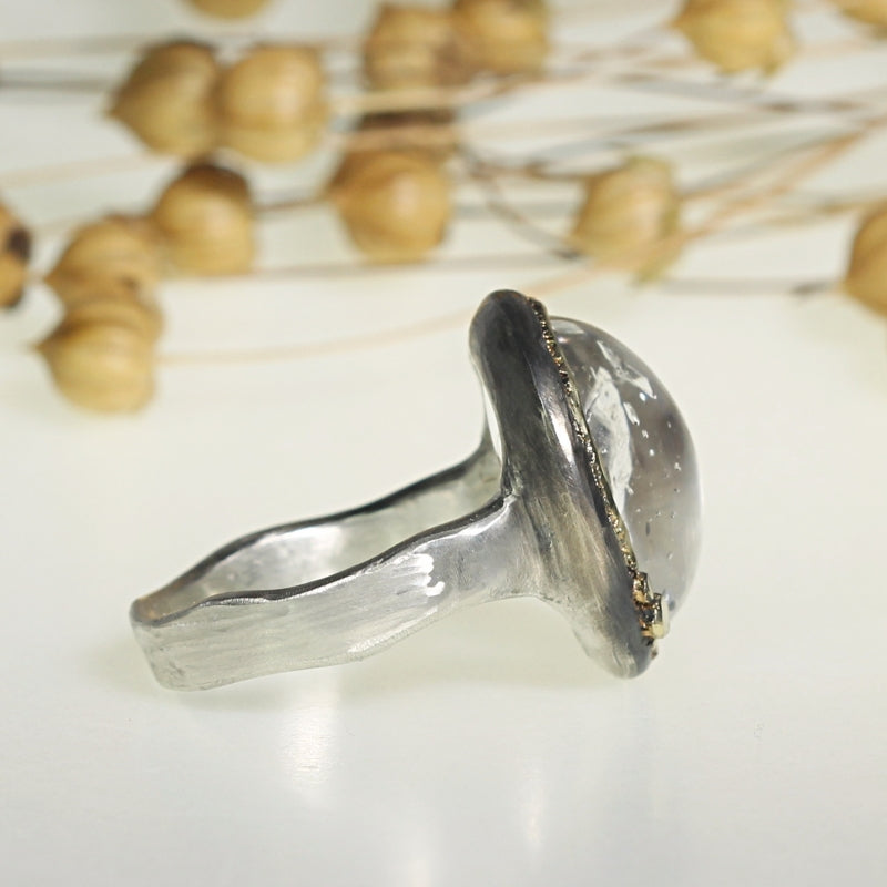 Ring with enhydro quartz