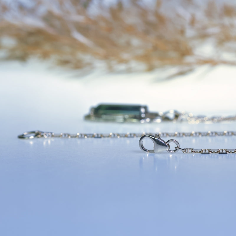 White gold necklace “Venetian mirror” with bluegreen tourmaline
