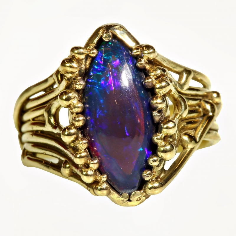 Gold ring Galaxy with dark blue opal