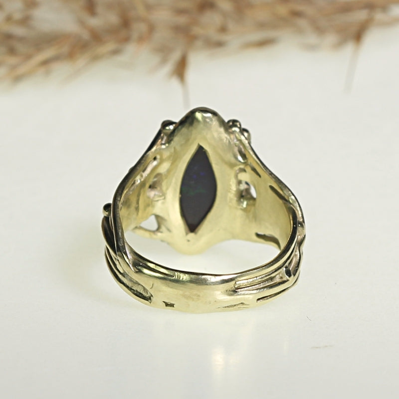 Gold ring Galaxy with dark blue opal