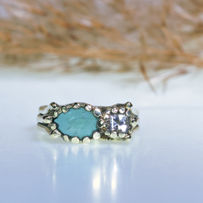 Gold ring with Paraíba tourmaline and danburite