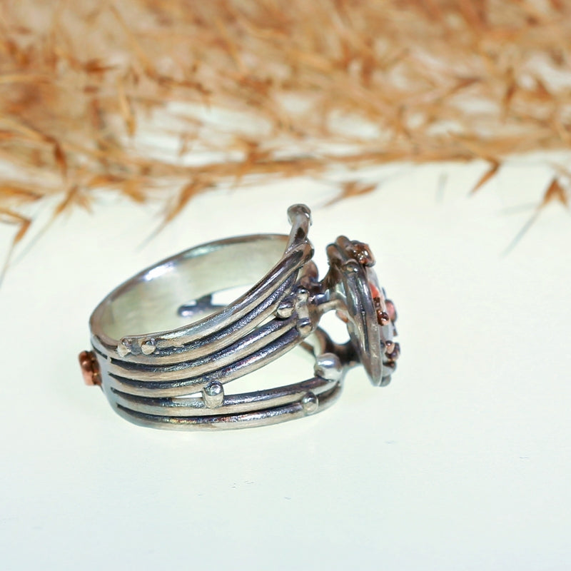 Wide Galaxy ring with irone oxide quartz